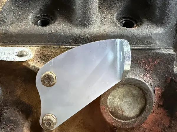 The ALT1 bracket fitted to an early MGB block
